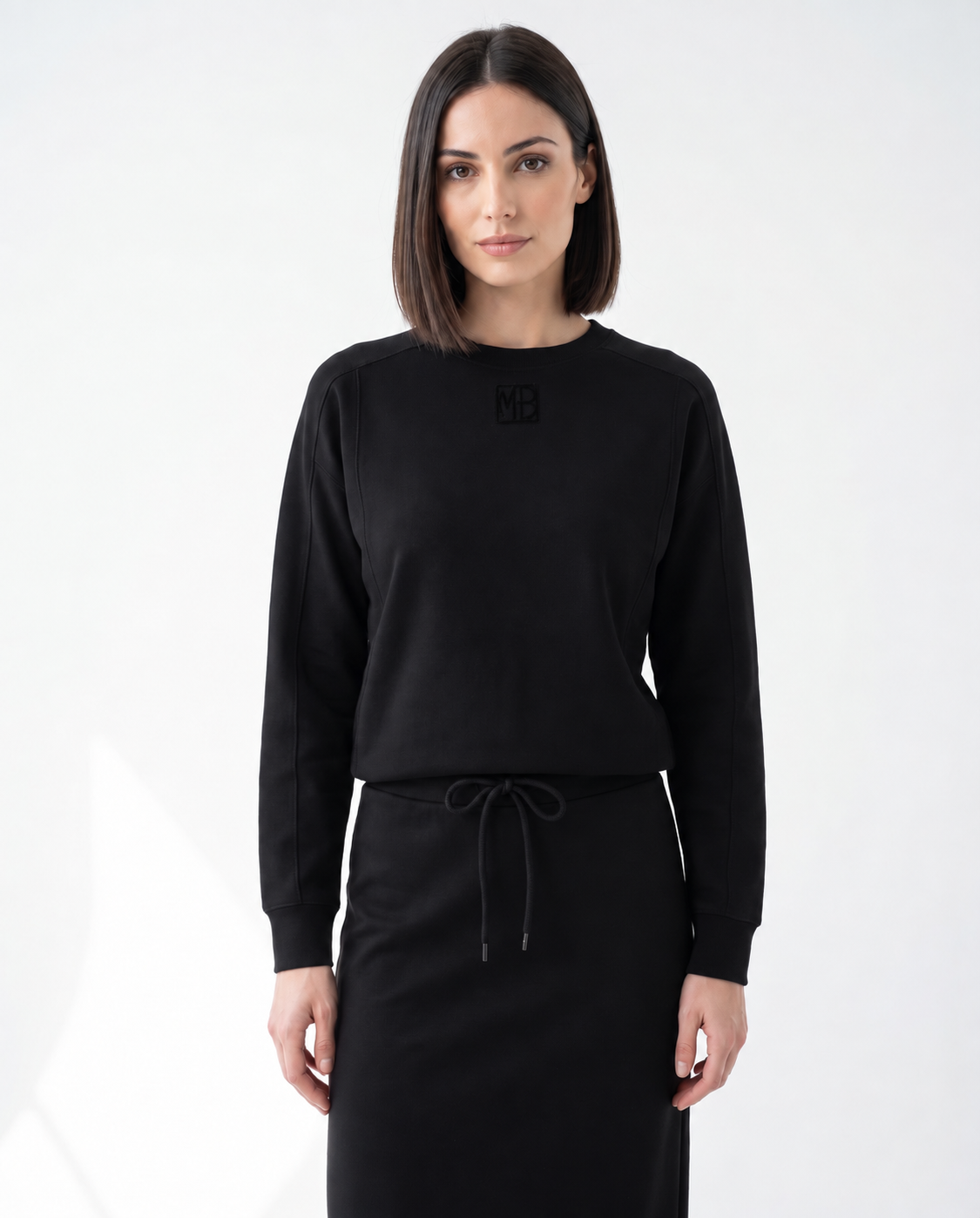 Black crewneck monogram sweatshirt with long sleeves and ribbed cuffs