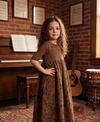 Brown floral smocked corduroy maxi jumper dress set with matching long sleeve shell.
