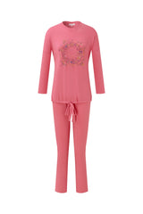 Pink pajama set with a long-sleeve top, drawstring pants, and floral medallion print