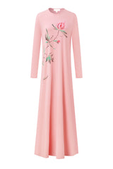 Long-sleeve pink nightgown with a flowing skirt and floral branch print