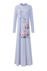 Light blue floral nightgown with long sleeves, a round neckline, and a flowing ankle-length skirt