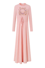 Pink long-sleeve nightgown with floral medallion, gathered drawstring waist and flowing skirt