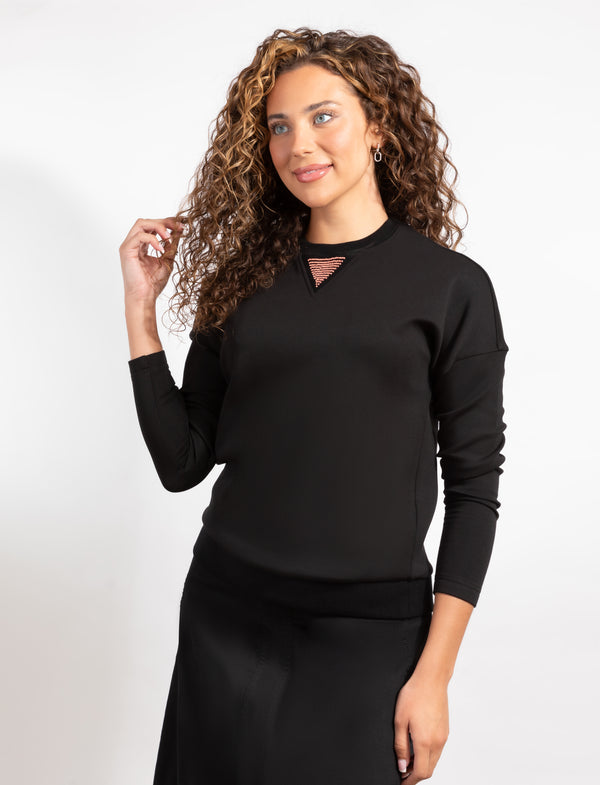 Black Long-Sleeve Top With Pink Neckline Detail For a Chic, Versatile Look