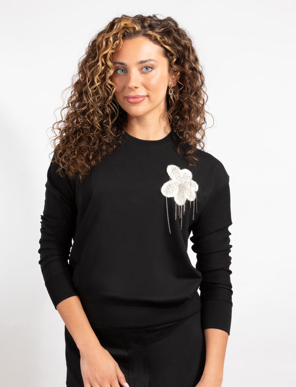 Black Long-Sleeve Top With White Floral Design