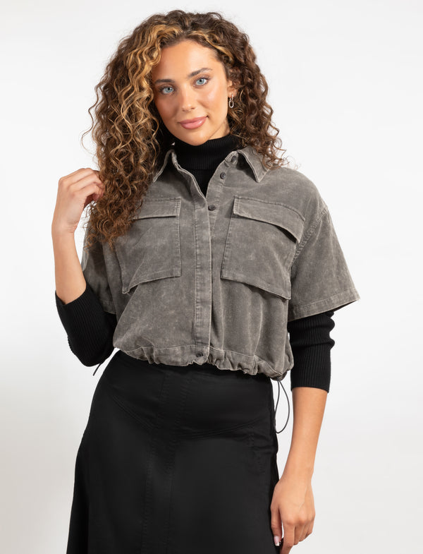 Button-Front Olive Short Sleeve Shirt Jacket With Large Chest Pockets And A Cropped Hem