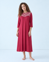 Wine red nightshirt with three-quarter sleeves and an embroidered panel across the neckline