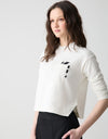 Cropped Pocket Sweatshirt with Black Starburst Motif Ivory
