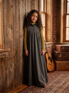 Gray sleeveless maxi dress for kids features button placket, pointy collar, tweed back insert and curve cut ruffled inverted empire waist.