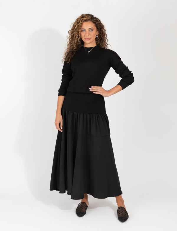 Black Two Piece Set Featuring Fitted Sweater And Flowing Maxi Skirt