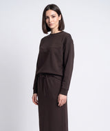 Brown crewneck sweatshirt with patch pocket and tie-front drawstring hem