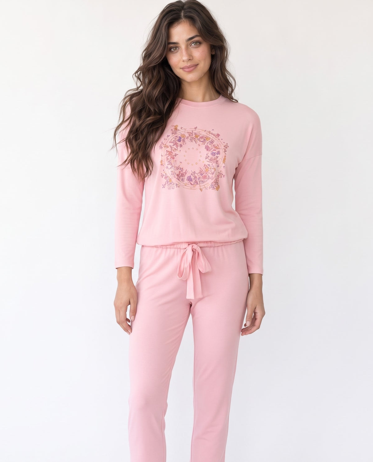 Pink floral medallion pajama set with long-sleeve top and drawstring pants, modeled front view