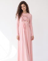 Pink floral medallion nightgown with long sleeves and a cinched drawstring waist, worn full length