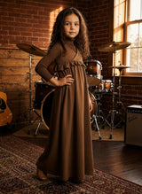 Kids' sleeveless coffee suede maxi dress with crossover bodice and ruffled waist.