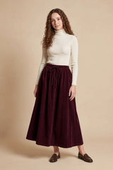 Plum corduroy maxi skirt with drawstring waist, gathered A-line hem