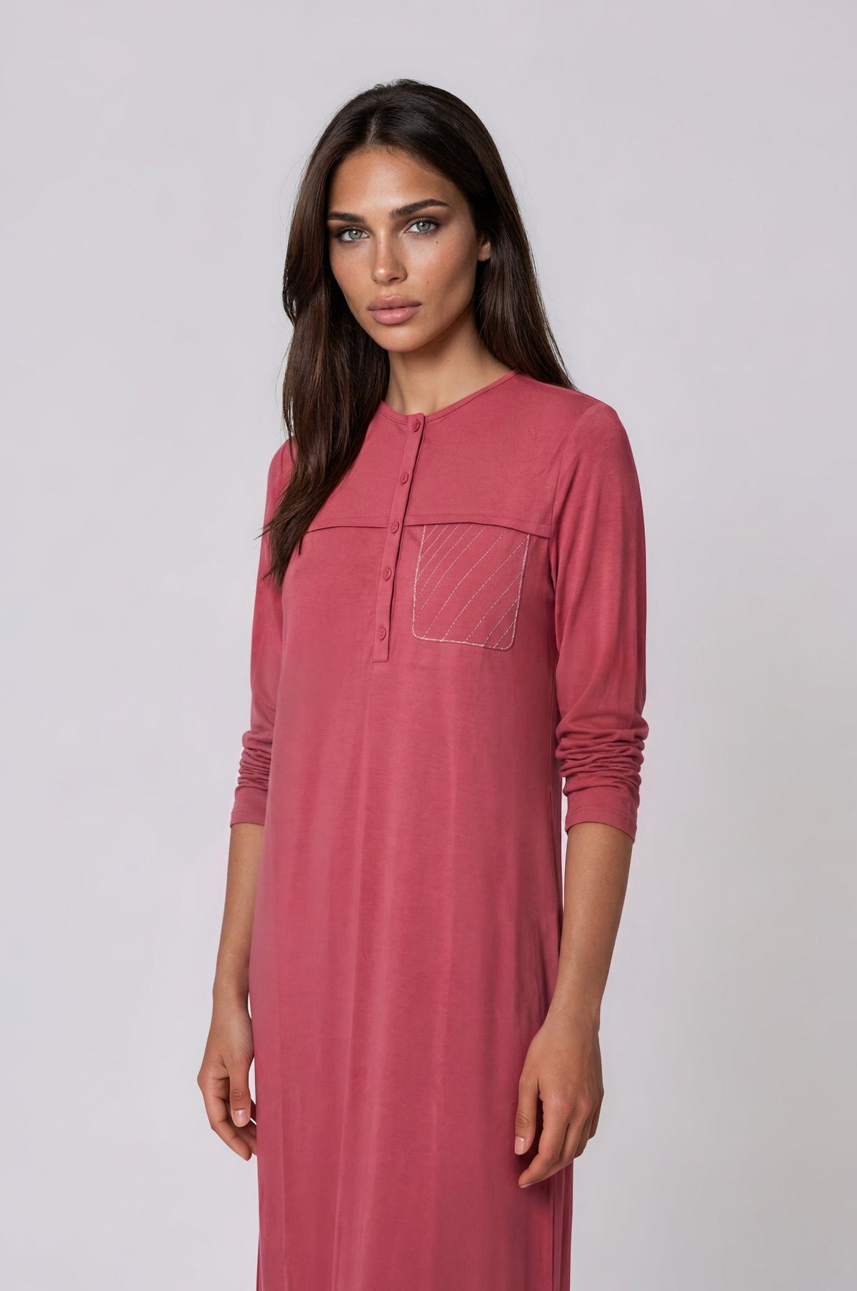 Half button front coral long sleeve nightgown with front pocket.