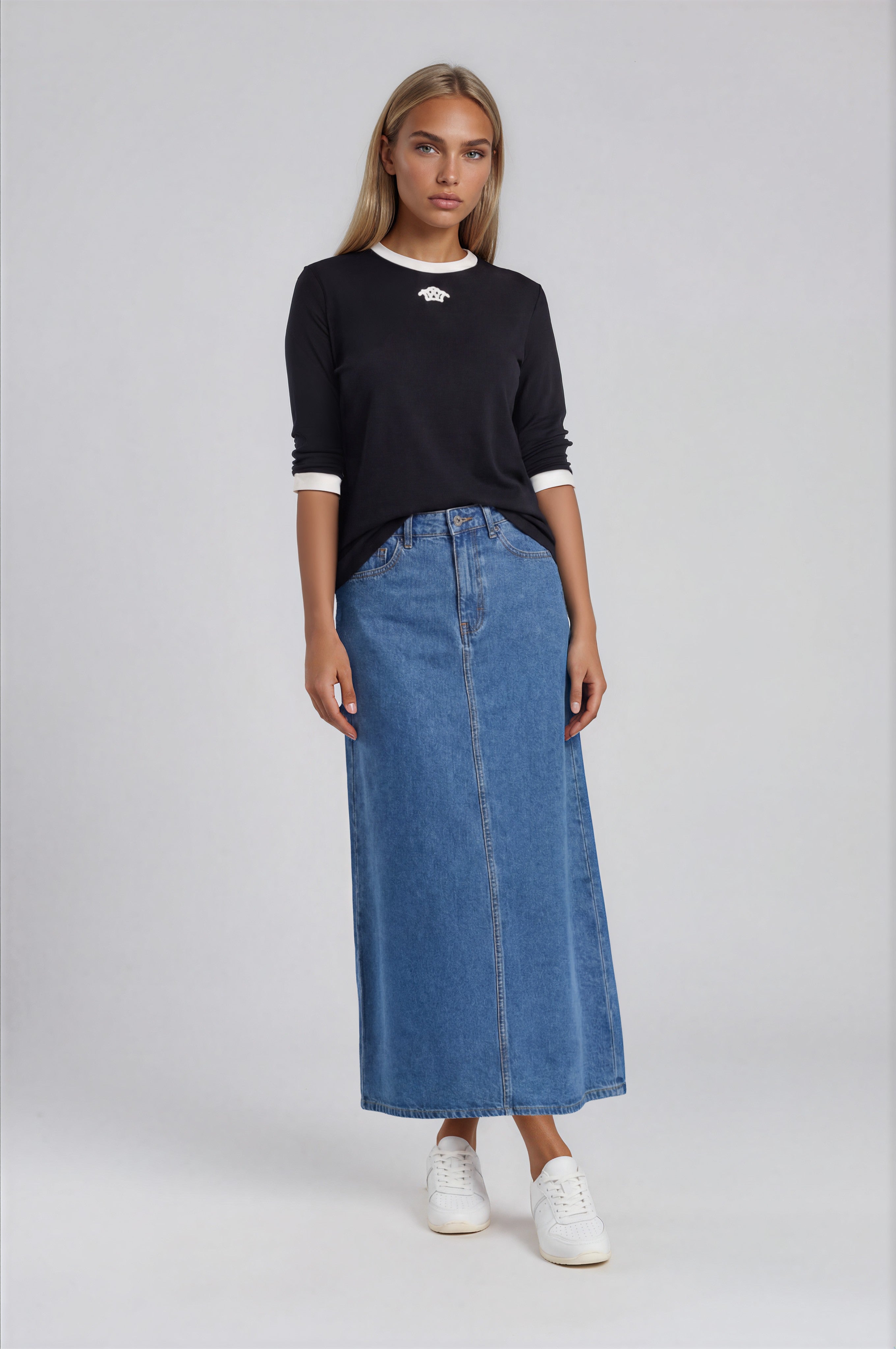 Black everyday tee-shirt top with white contrast trim and logo motif.