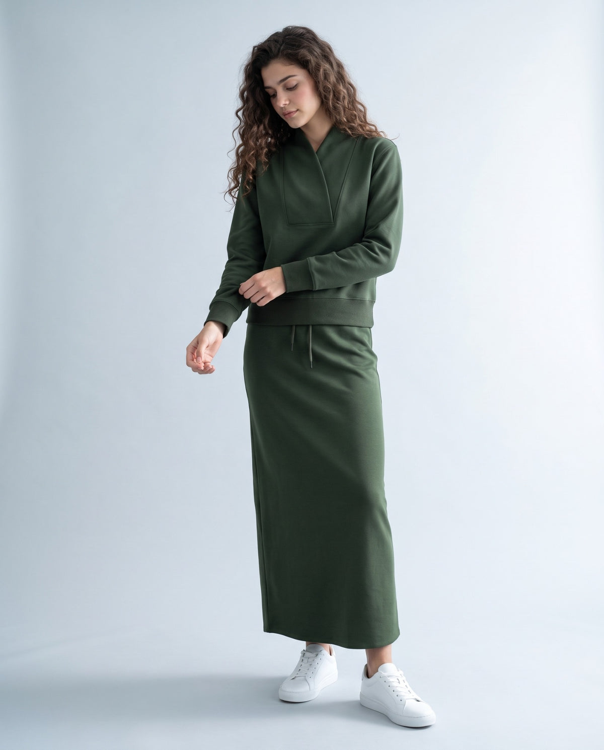 Olive green shawl-neck pullover with long sleeves and relaxed fit, front pocket