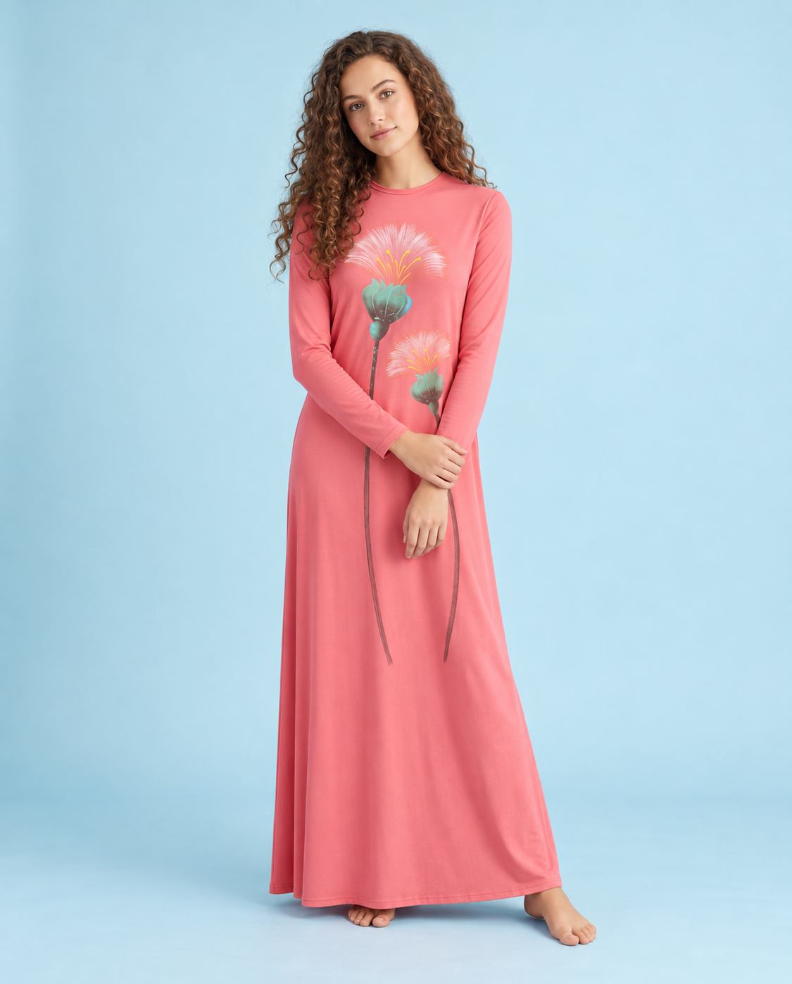 Pink long-sleeve nightgown with a floor-length skirt and whimsical flower print