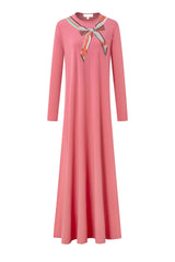 Pink long-sleeve nursing nightgown with a colorful scarf-print bow at the neckline