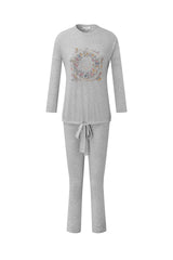 Grey pajama set with long-sleeve top, drawstring pants, and floral medallion print