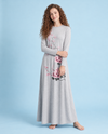 Heather gray floral nightgown worn on a model, with long sleeves and a flowing full-length skirt