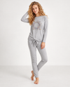 Grey two-piece pajama set with long sleeves, drawstring pants, and a floral medallion print