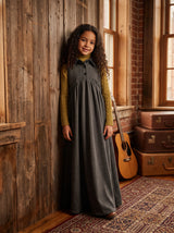 Gray sleeveless maxi dress for kids features button placket, pointy collar, tweed back insert and curve cut ruffled inverted empire waist.