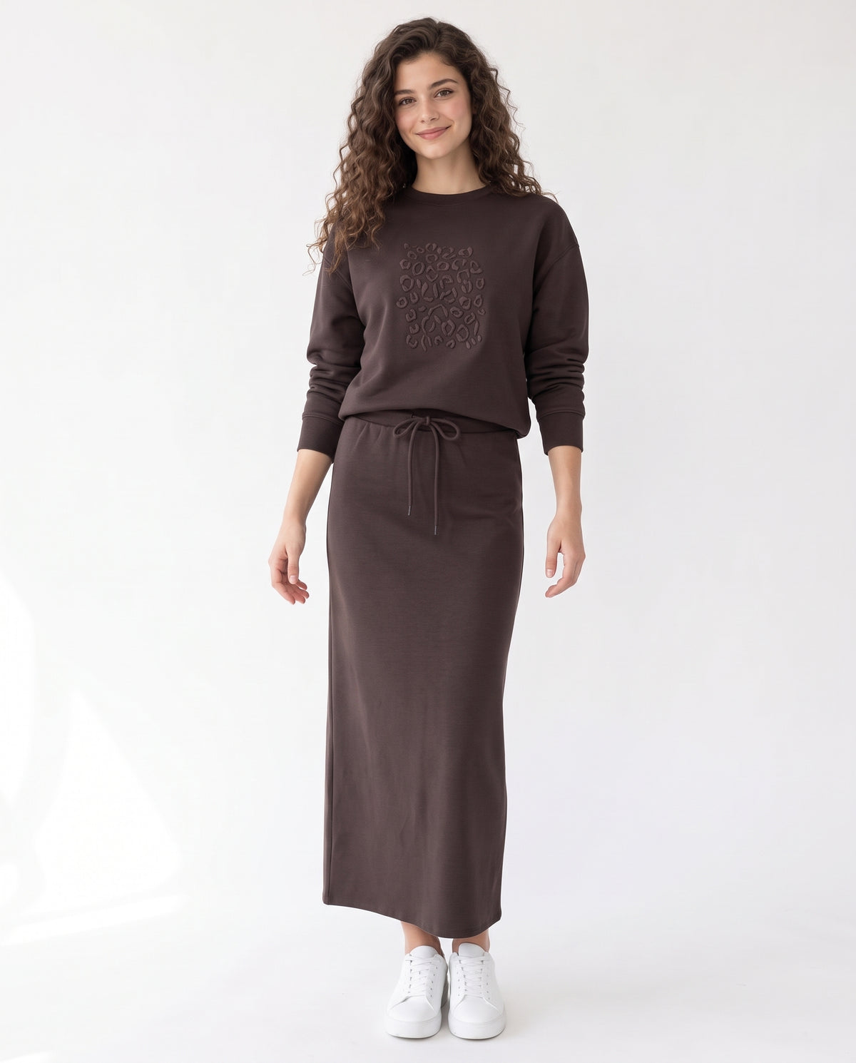 Brown embossed leopard print crewneck sweatshirt, long sleeves, drawstring waist tie.