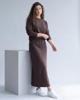 Brown embossed leopard print crewneck sweatshirt with long sleeves and drawstring waist tie.