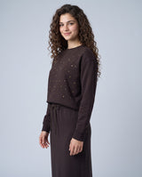 Dark brown crewneck sweatshirt with scattered rhinestones, long sleeves, ribbed cuffs