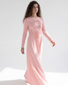 Long pink nightgown with floral chest medallion, gathered waist and floor-length flowing skirt
