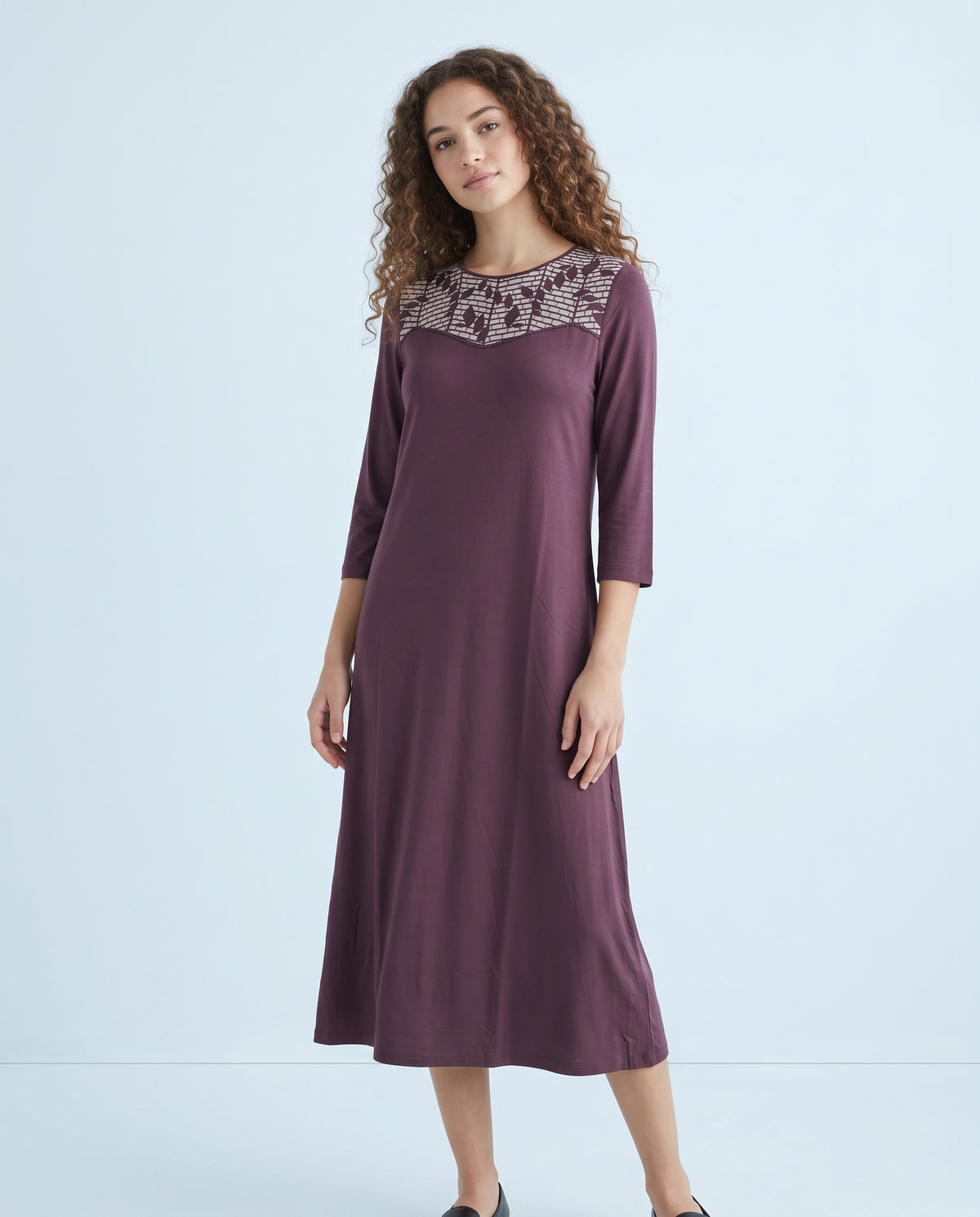 Eggplant nightshirt with three-quarter sleeves and an embroidered geometric panel across the neckline